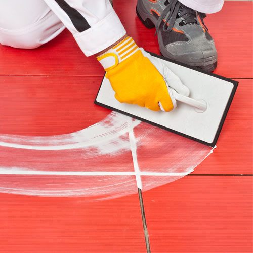 Grouting tiles