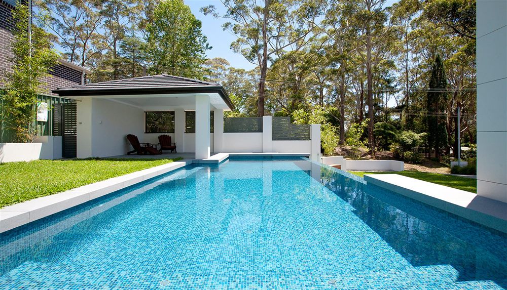 Tiled swimming pool and outdoor area